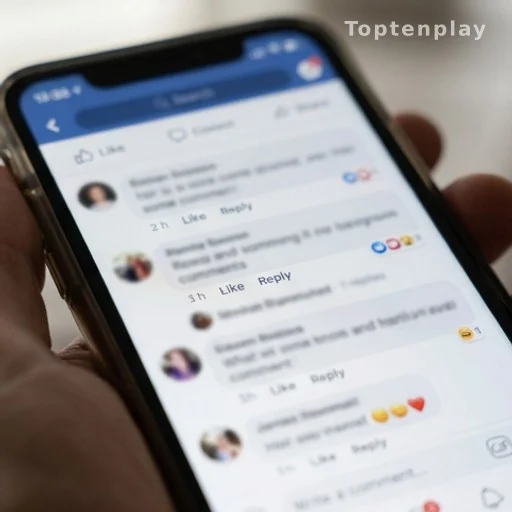 Smartphone affichant un fil de commentaires sur les réseaux sociaux, cyberharcèlement